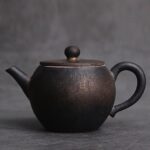 front view of 5oz black mottled japanese ceramic teapot