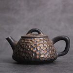antique style japanese ceramic teapot dark brown with golden speckles full view