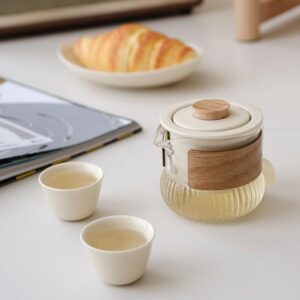 beige japanese portable travel tea set with glass pitcher ceramic cups and carrying case