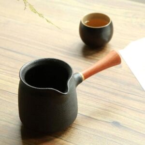 9.5oz black ceramic fairness cup gong dao bei with wood handle and brass accent full product view