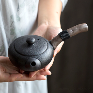 black rustic ceramic kyusu japanese teapot full side view