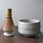 complete 4 piece traditional japanese matcha set with white chawan bowl bamboo chasen