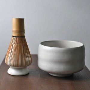 complete 4 piece traditional japanese matcha set with white chawan bowl bamboo chasen