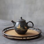full view of 8oz handcrafted japanese ceramic teapot with golden crane motif