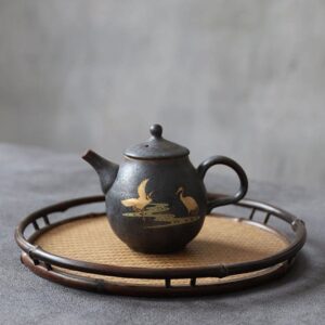 full view of 8oz handcrafted japanese ceramic teapot with golden crane motif