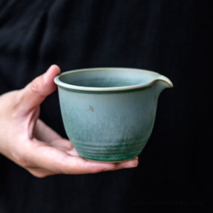 handcrafted ginkgo leaf ceramic fairness cup gong dao bei side view
