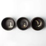 exterior view of 2.7oz hand-painted black zen japanese tea bowl