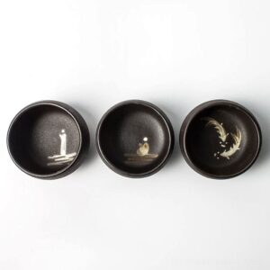 exterior view of 2.7oz hand-painted black zen japanese tea bowl