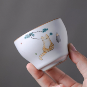 collection of hand-painted japanese ceramic tea cups cat landscape peony
