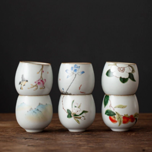collection of hand painted japanese tea cups gold rimmed ceramic