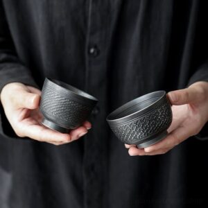 antique style black textured japanese tea bowl multiple sizes