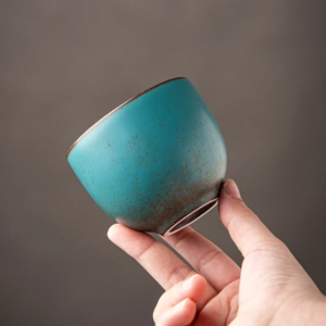 Handcrafted japanese blue green ceramic tea cup 5oz side view