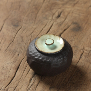 handcrafted japanese rock texture ceramic japanese tea canister main view
