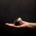 collection of handcrafted japanese clay tea cups with rustic finish