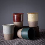 handcrafted japanese clay tea cup with half glaze speckled texture