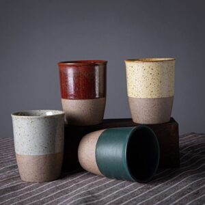 handcrafted japanese clay tea cup with half glaze speckled texture