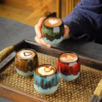 handcrafted japanese jian zhan tea cup with coffee latte