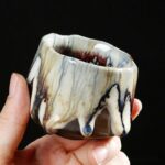 collection of handcrafted japanese jianzhan tea cups with unique kiln glaze patterns