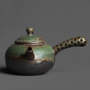 full view of handcrafted green glaze japanese kyusu ceramic teapot
