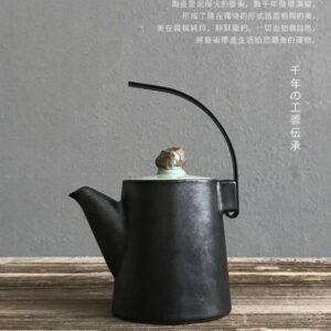 Handcrafted black Japanese teapot with natural stone knob main product view