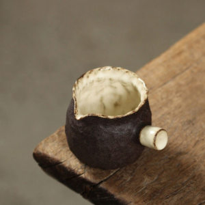 handcrafted wabi-sabi ceramic fairness cup mini tea pitcher 4oz side view