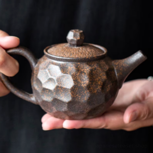 handmade japanese gilded ceramic teapot style a close up texture view