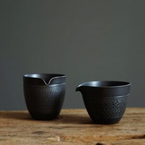 Handmade Japanese matte black ceramic fairness cup gong dao bei
