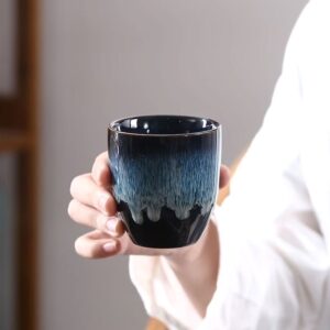 handcrafted japanese blue jianzhan tea cup with gradient glaze