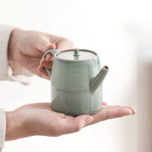 japanese celadon glaze ceramic teapot with built-in filter full view