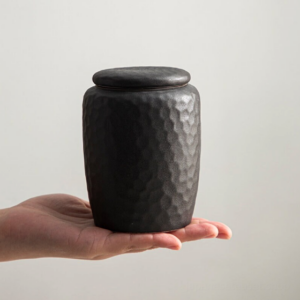 handcrafted black japanese ceramic airtight tea canister closed front view