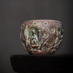 handcrafted japanese ceramic buddha tea cup front view