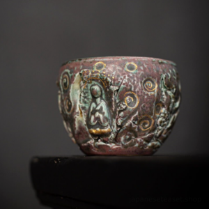 handcrafted japanese ceramic buddha tea cup front view