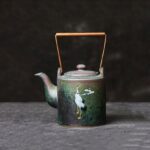 japanese ceramic crane handled teapot with cloud motif full product view