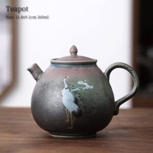 handcrafted japanese ceramic teapot with crane and cloud pattern 9oz