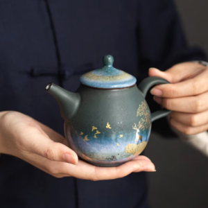 hand-painted japanese ceramic teapot with deer and starry sky pattern main view