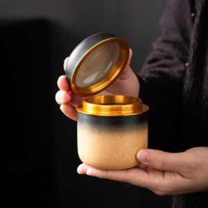 japanese ceramic airtight loose tea canister on wooden background