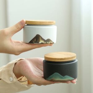 handcrafted japanese ceramic tea canister with natural bamboo lid mountain pattern
