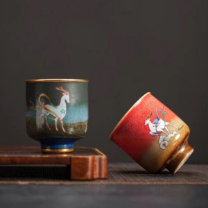hand painted japanese ceramic tea cup with deer and panda motifs