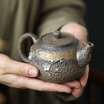 japanese handcrafted coarse pottery plum blossom teapot 6.76oz main product view