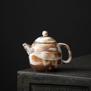 japanese dragon egg handmade ceramic teapot with brown streaked glaze main view