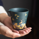 Modern 8oz Japanese fairness cup with golden deer and mountain pattern front view
