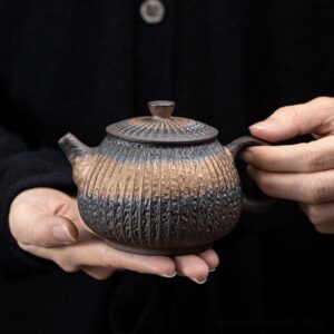 handcrafted japanese gilded iron glaze ceramic teapot main view