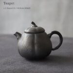 full product view of japanese handcrafted dark grey ceramic pumpkin teapot