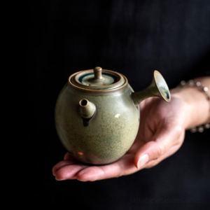 handcrafted japanese kyusu side handle teapot with gold ginkgo motif vintage green glaze
