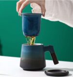 japanese loose leaf tea infuser mug with ceramic body and wood handle 14oz