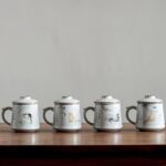 japanese loose leaf tea infuser mug with hand drawn cat pattern 13oz