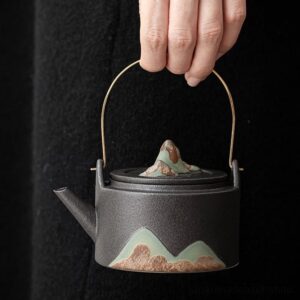 japanese mountain handled ceramic teapot black variation main view