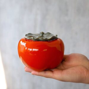 full view of persimmon shaped japanese ceramic tea caddy loose leaf tea storage