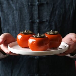 japanese persimmon shaped ceramic japanese tea canister front view