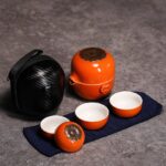 full set display of 6oz japanese persimmon ceramic portable travel tea set with travel bag